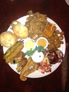 Soul food and more: Biscuits, Fried Okra, Fried Green Tomatoes, Straw Onion Rings, Fried Dill Pickles, Spring Rolls, BBQ Tri Tips, Chicken Strips, and Quesadillas with BBQ beef inside.